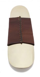 brass and leather shoehorns